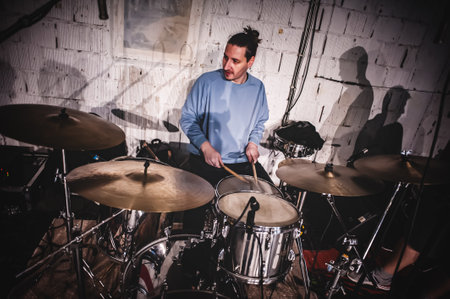 Drum music band drummer artist have solo live performance on a stage. Repetition and practiceの写真素材