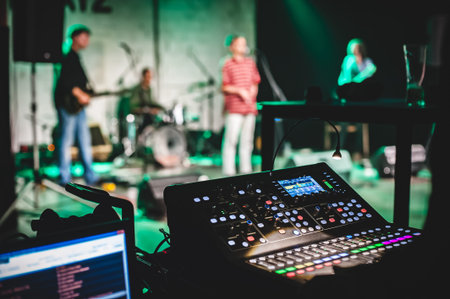 Professional audio mix sound control and lights equipment panel console. Music producer, audio...