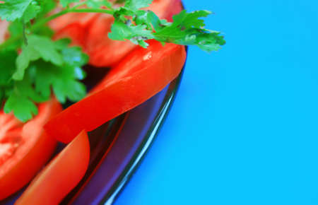 The cut tomatoes with greens03の写真素材