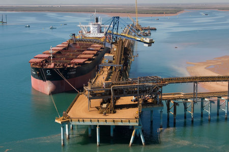 Iron ore ship being filled - aerial