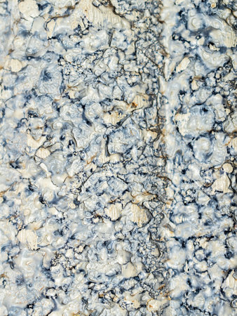In the photograph, rough concrete degraded into gray tones.の写真素材