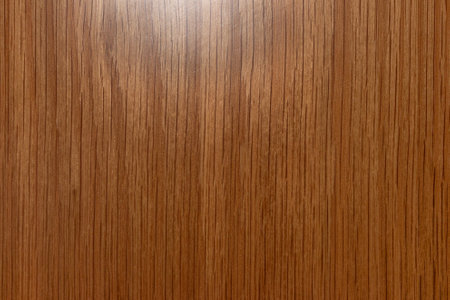 In the photograph there is a wooden background with vertical veins.の写真素材