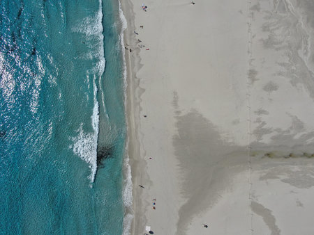 Between waves and earthの写真素材
