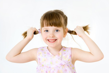 Portrait of funny lovely little girlの写真素材