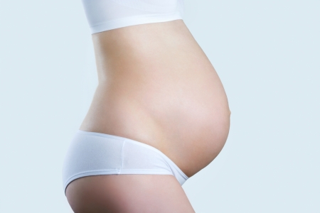 Close-up of pregnant womanの写真素材