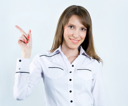Successful business woman. Isolated over gray backgroundの写真素材