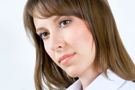 Successful business woman. Isolated over gray backgroundの写真素材