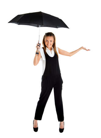 young girl in a business suit and carrying an umbrella in his hand on a white backgroundの写真素材