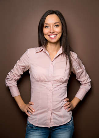 Successful business woman looking confident and smilingの写真素材