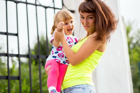 Mother and daughter in the parkの写真素材