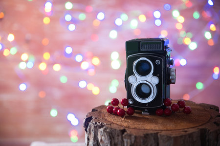 Indoor Christmas decorations with vintage cameraの写真素材