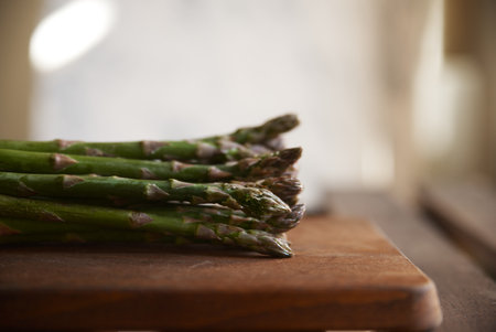 Fresh green asparagus on a wooden table and table.の写真素材