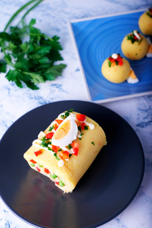 Typical Peruvian dish called causa rellena, which is served as a starter.の写真素材