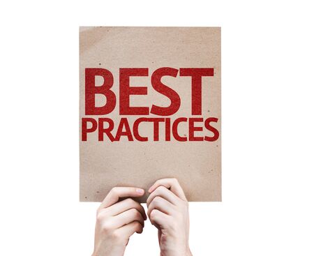 Hands holding cardboard with Best Practices on white backgroundの写真素材