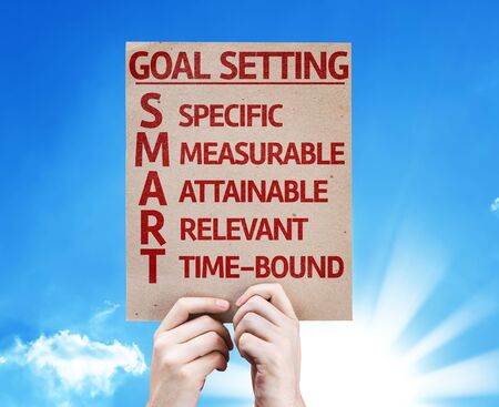 Cardboard on goal setting against sunny backgroundの写真素材