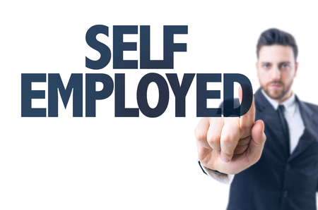 Business man pointing the text: Self Employedの写真素材