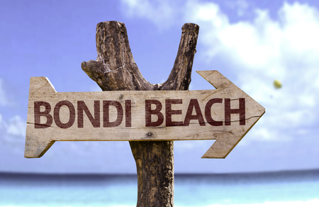 Bondi Beach sign with arrow on beach backgroundの写真素材