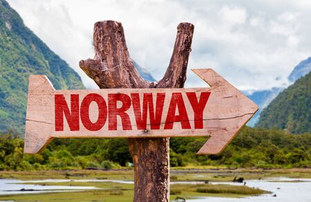 Wooden sign board in wetland with text: Norwayの写真素材