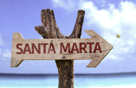Santa Marta sign with arrow on beach backgroundの写真素材