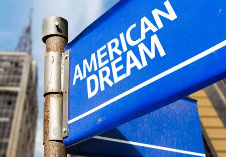 American dream signpost on building backgroundの写真素材