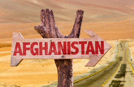 Afghanistan sign with arrow on desert backgroundの写真素材