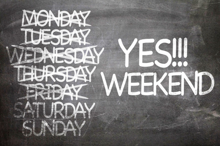 Yes!!! Weekend written on blackboardの写真素材