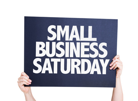 Hands holding cardboard on white background with text: Small business Saturdayの写真素材