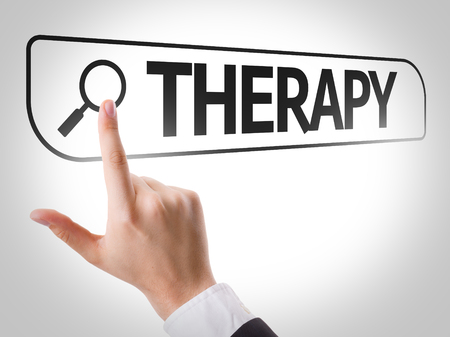 Hand searching online on white background with text: Therapy Hand searching online on white background with text: Therapy