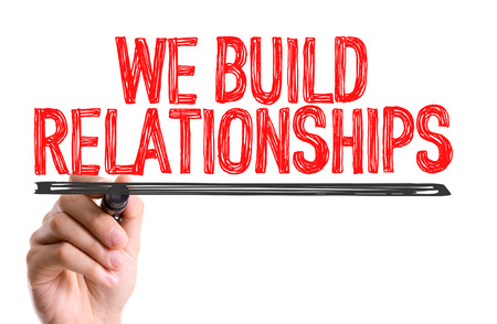 We build relationships written with a marker penの写真素材