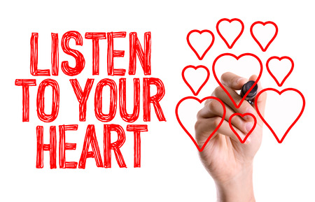 Listen to your heart written with a marker penの写真素材