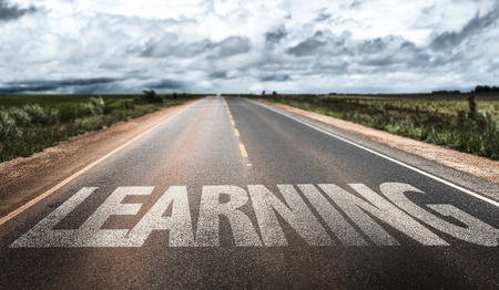 Learning written on the roadの写真素材