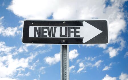 New life sign with arrow on sunny backgroundの写真素材