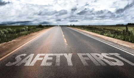 Safety first written on the roadの写真素材