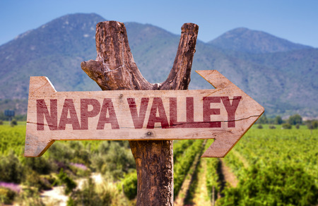 Wooden sign board in park with text: Napa Valleyの写真素材