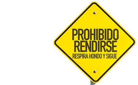 Prohibido rendirse respira hondo y sigue (don't surrender, take a deep breath and keep going in Spanish) sign on white backgroundの写真素材