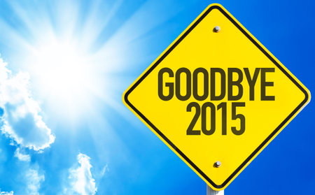 Goodbye 2015 sign with sunny background