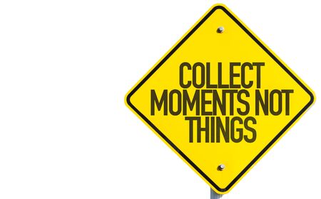 Collect Moments Not Things sign isolated on white backgroundの写真素材