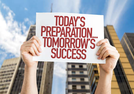 Todays Preparations...Tomorrows Success placard with urban backgroundの写真素材