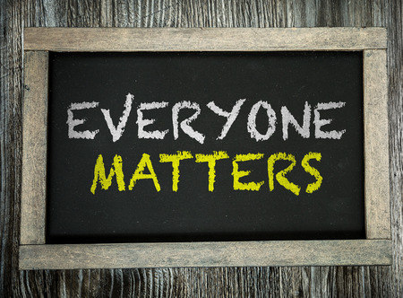 Everyone Matters written on chalkboardの写真素材