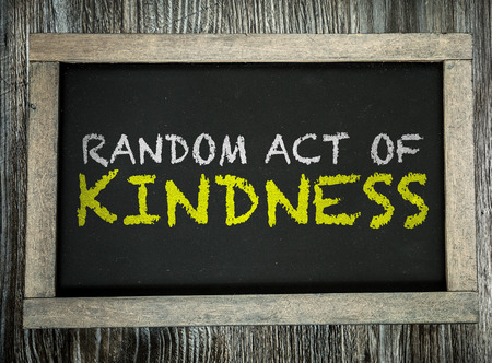 Random Act of Kindness written on chalkboardの写真素材
