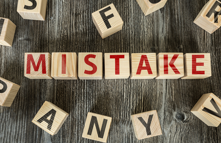 Wooden Blocks with the text: Mistakeの写真素材