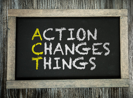Action Changes Things written on chalkboardの写真素材