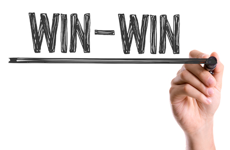 Hand with marker writing the word Win-Winの写真素材