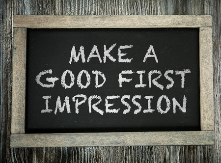 Make a Good First Impression written on chalkboardの写真素材