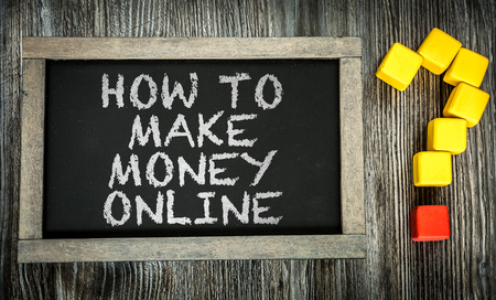 How To Make Money Online written on chalkboardの写真素材
