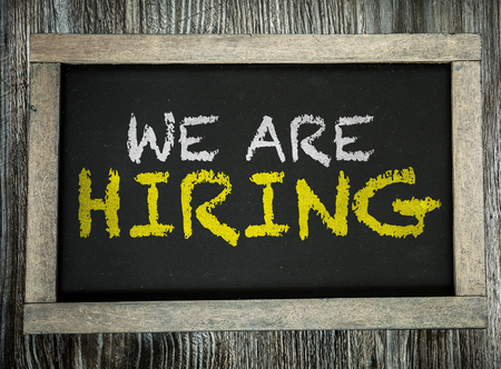 We Are Hiring written on chalkboardの写真素材