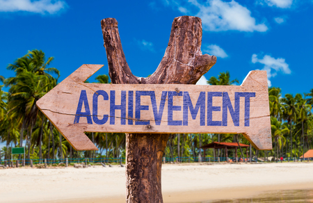 Achievement arrow with beach backgroundの写真素材