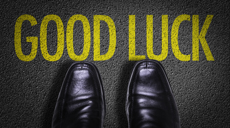 Text on road with business shoes background: Good luckの写真素材