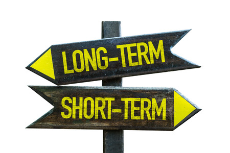Long-term/short-term sign with arrow on white backgroundの写真素材