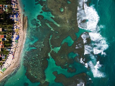 Aerial view of a town by the beachの写真素材